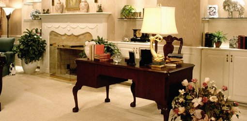 Living room with wood desk.