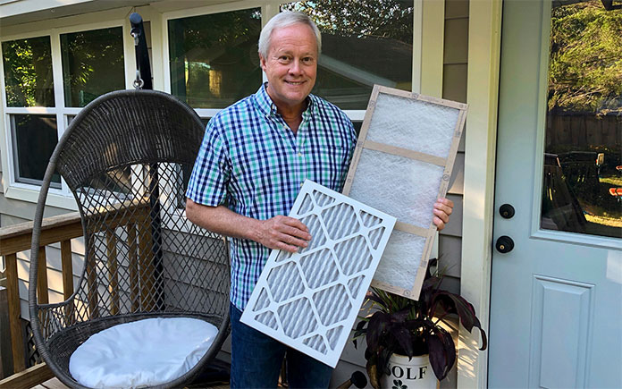 Danny Lipford displays air filters at Chelsea Lipford Wolf's home