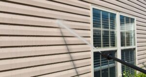 using pressure washer on siding