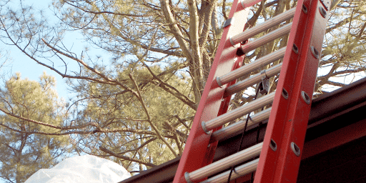 ladder on a gutter system