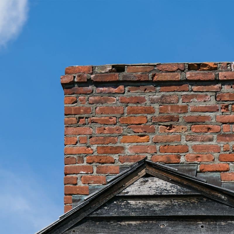 old chimney with missing bricks