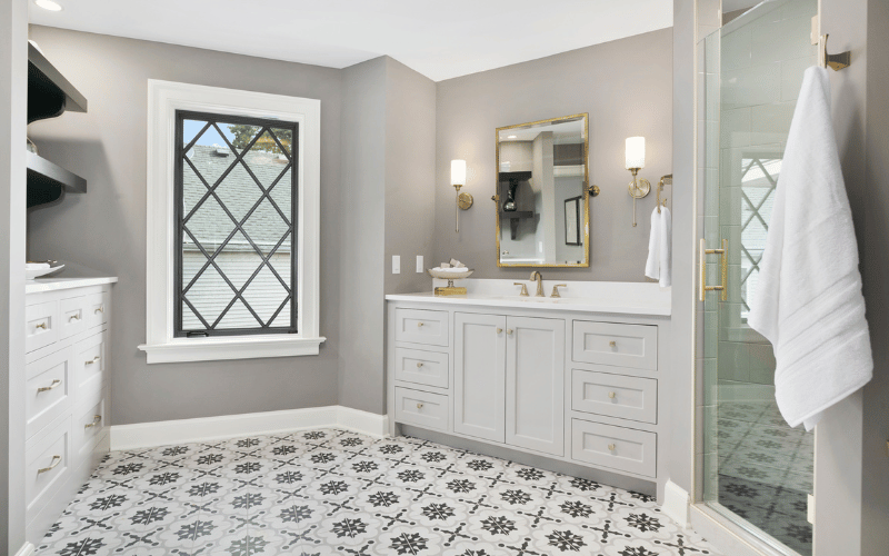 Decorative tile flooring in a bathroom